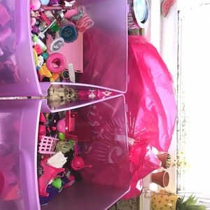 Bins and bags full of doll acssesories
